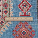 Wool pile close-up of blue & red Kazak-inspired wool rug 29648.
