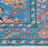 Border and edge detail of blue & red Kazak-inspired wool rug 29649.