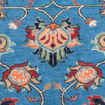 Pattern detail of blue & red Kazak-inspired wool rug 29649.