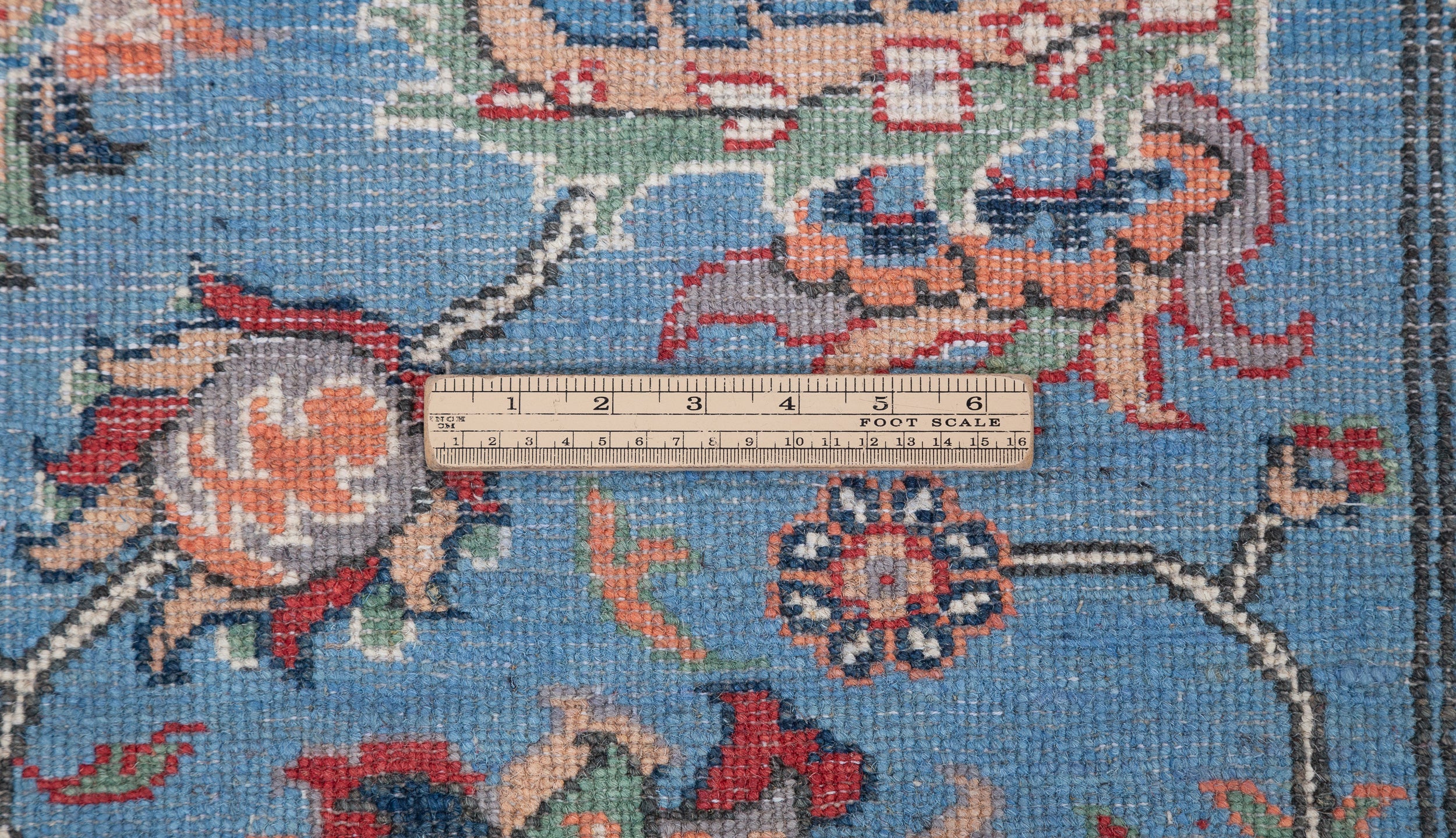 Wool pile close-up of blue & red Kazak-inspired wool rug 29649.