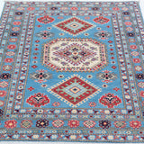 Full view from a low angle of blue & ivory Kazak-inspired wool rug 29650.