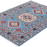 Full view at an angle of blue & ivory Kazak-inspired wool rug 29650.