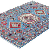 Full view at an angle of blue & ivory Kazak-inspired wool rug 29650.