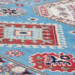 Pattern detail of blue & ivory Kazak-inspired wool rug 29650.