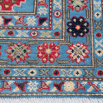 Border and edge detail of blue & ivory Kazak-inspired wool rug 29650.