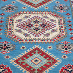Pattern detail of blue & ivory Kazak-inspired wool rug 29650.