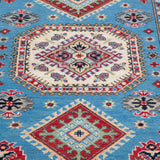 Pattern detail of blue & ivory Kazak-inspired wool rug 29650.