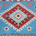 Pattern detail of blue & ivory Kazak-inspired wool rug 29650.