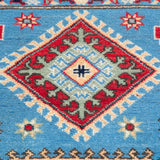 Pattern detail of blue & ivory Kazak-inspired wool rug 29650.