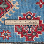 Wool pile close-up of blue & ivory Kazak-inspired wool rug 29650.