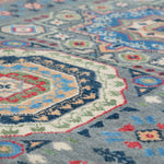 Pattern detail of blue & ivory Kazak-inspired wool rug 29651.