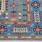 Border and edge detail of blue & ivory Kazak-inspired wool rug 29651.
