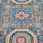 Pattern detail of blue & ivory Kazak-inspired wool rug 29651.