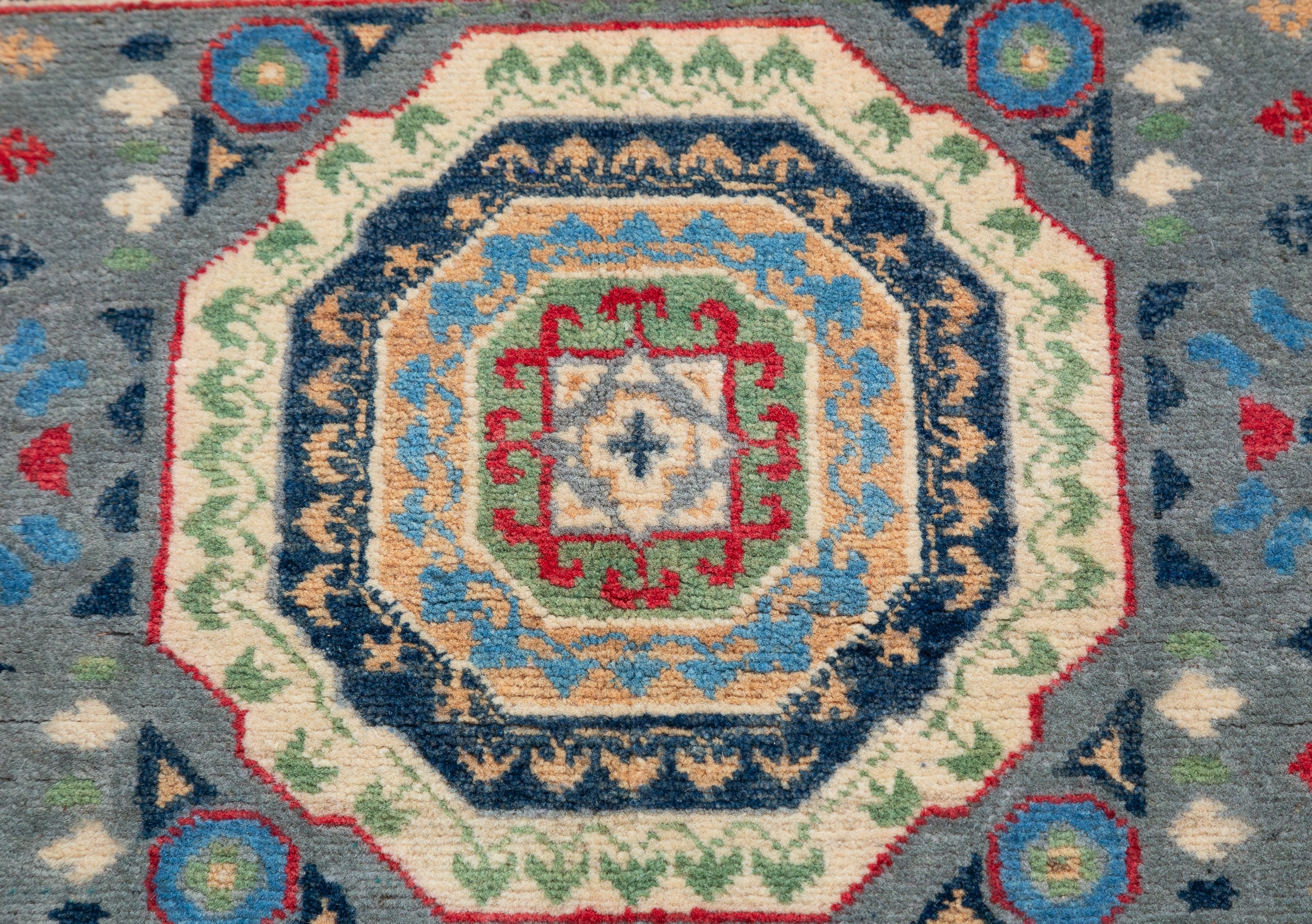 Pattern detail of blue & ivory Kazak-inspired wool rug 29651.