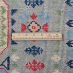 Wool pile close-up of blue & ivory Kazak-inspired wool rug 29651.