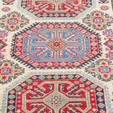 Pattern detail of ivory & red Kazak-inspired wool rug 29652.