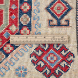 Wool pile close-up of ivory & red Kazak-inspired wool rug 29652.
