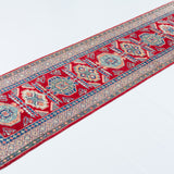 Full view at an angle of red & blue Kazak-inspired wool runner 29654.
