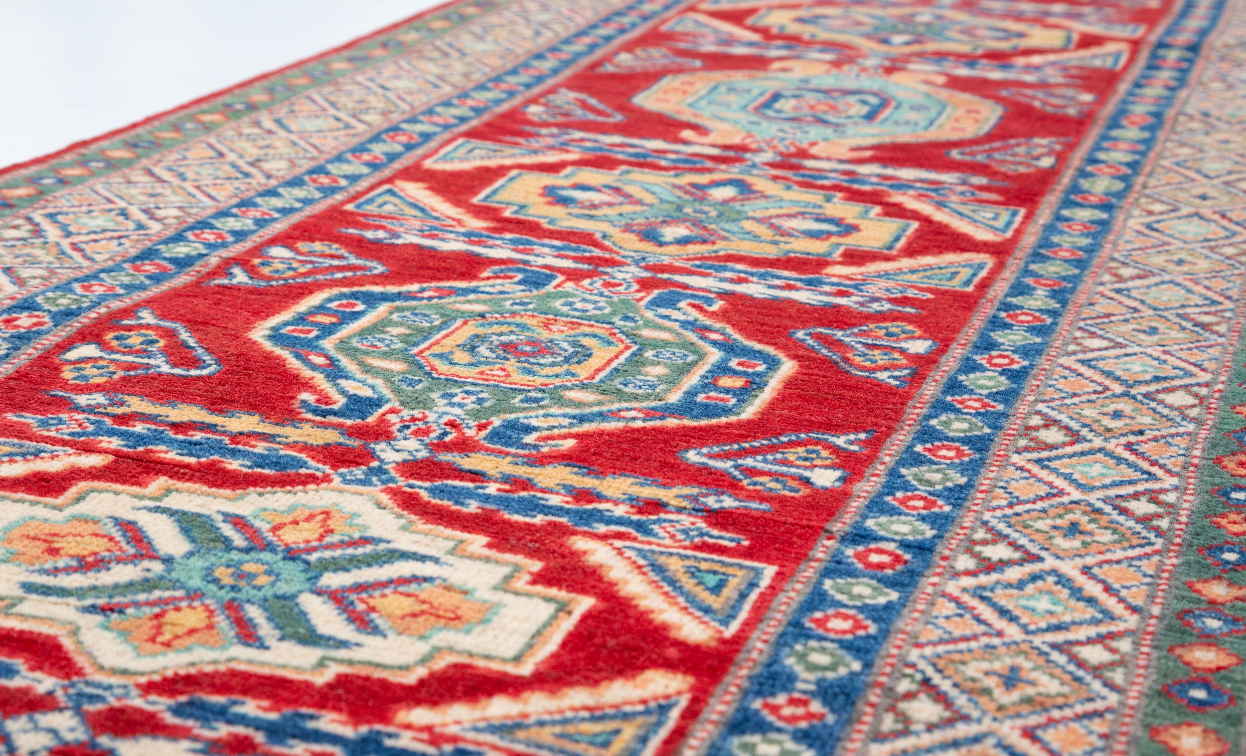 Pattern detail of red & blue Kazak-inspired wool runner 29654.