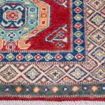 Border and edge detail of red & blue Kazak-inspired wool runner 29654.