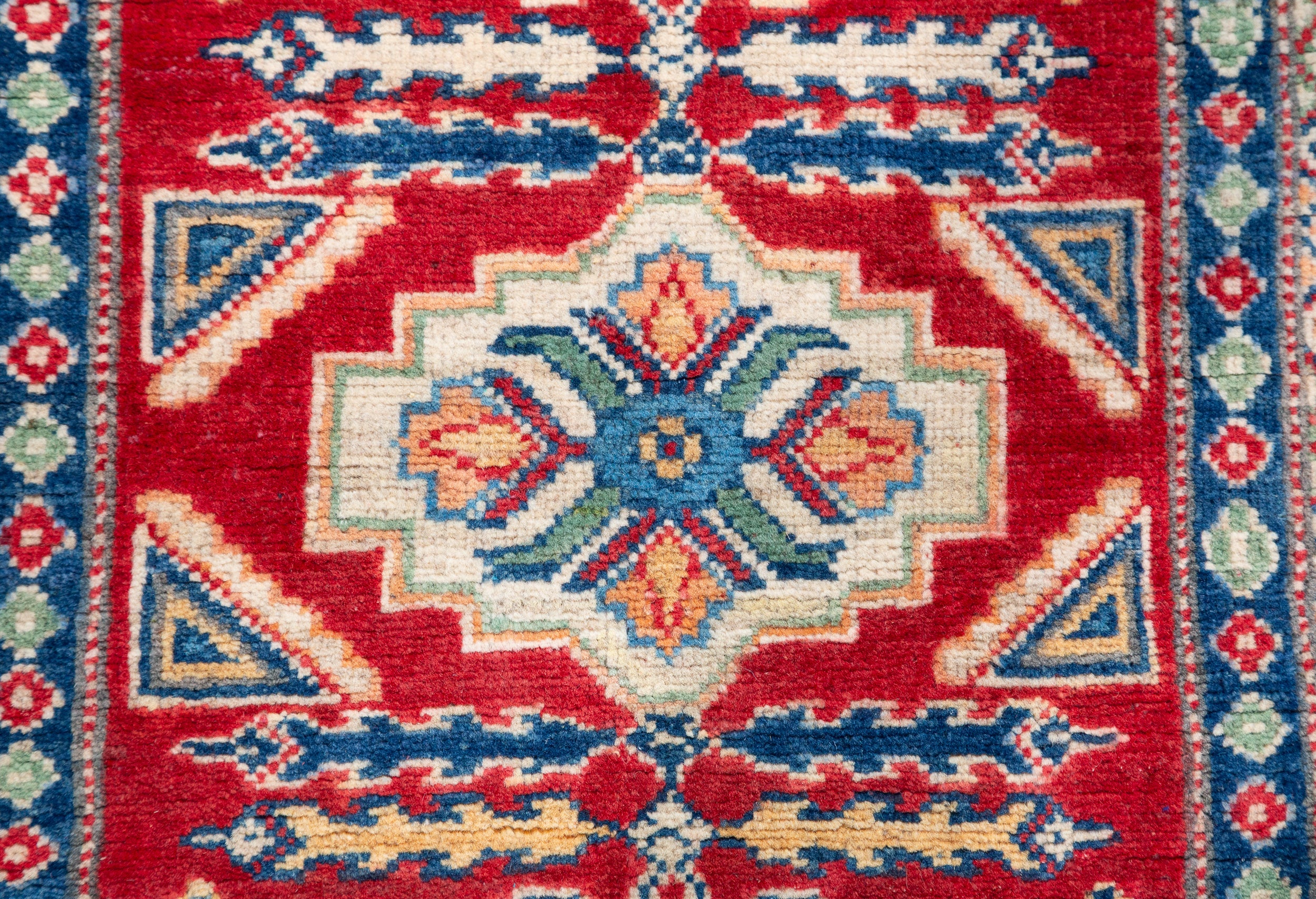 Pattern detail of red & blue Kazak-inspired wool runner 29654.