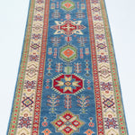 Full view from a low angle of blue & ivory Kazak-inspired wool runner 29655.