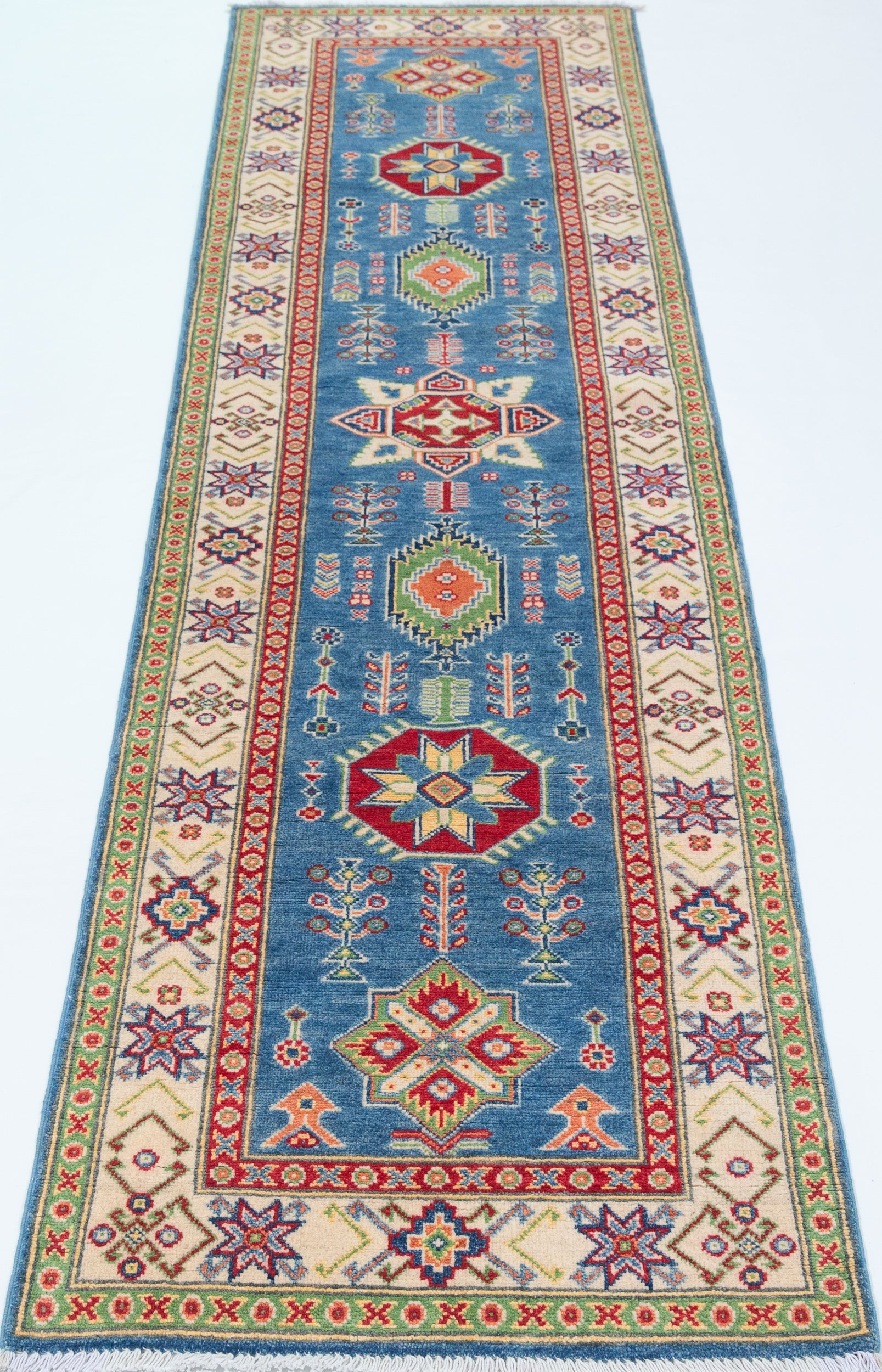 Full view from a low angle of blue & ivory Kazak-inspired wool runner 29655.