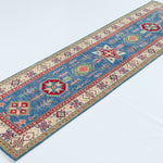Full view at an angle of blue & ivory Kazak-inspired wool runner 29655.
