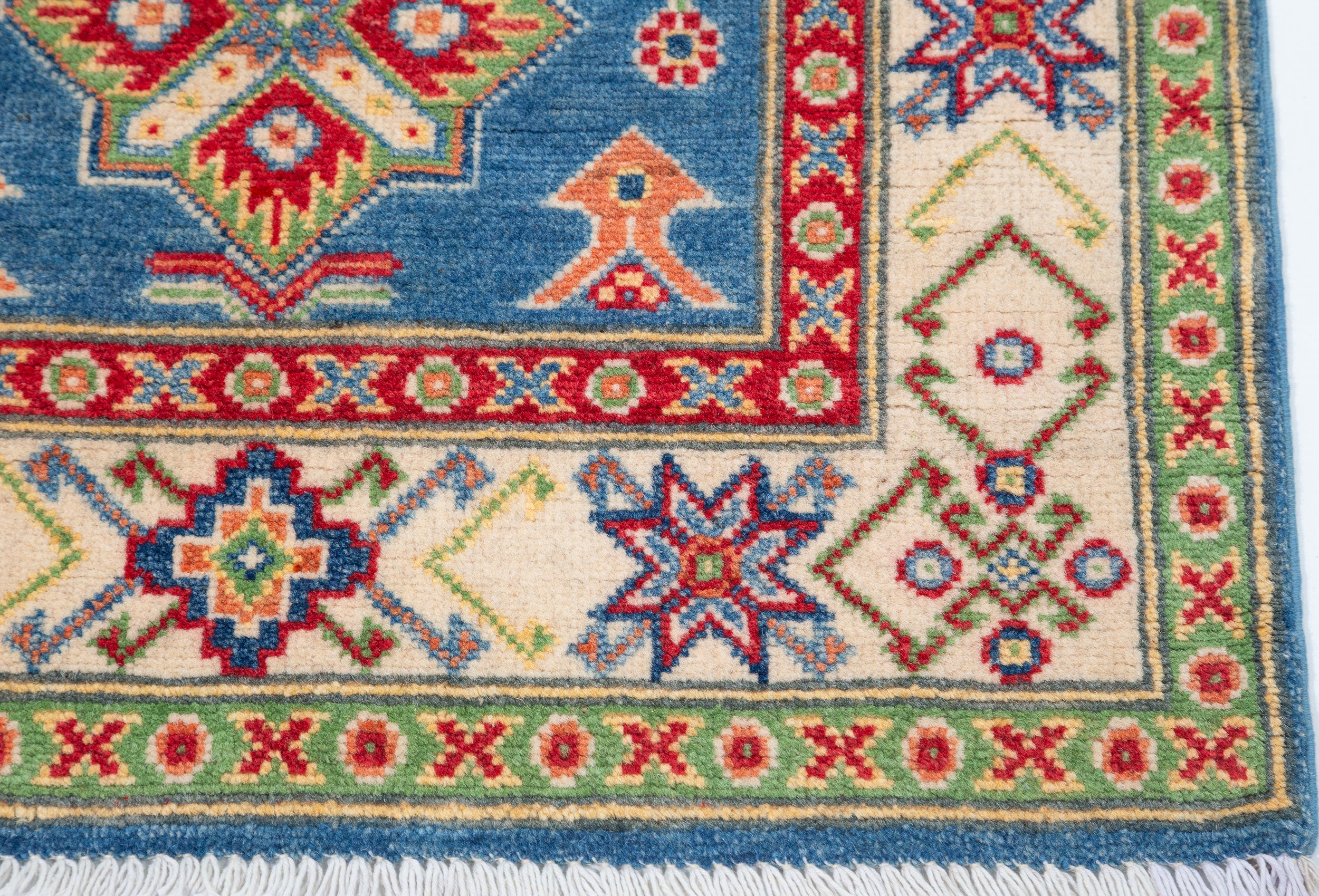 Border and edge detail of blue & ivory Kazak-inspired wool runner 29655.