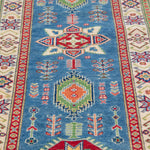 Pattern detail of blue & ivory Kazak-inspired wool runner 29655.
