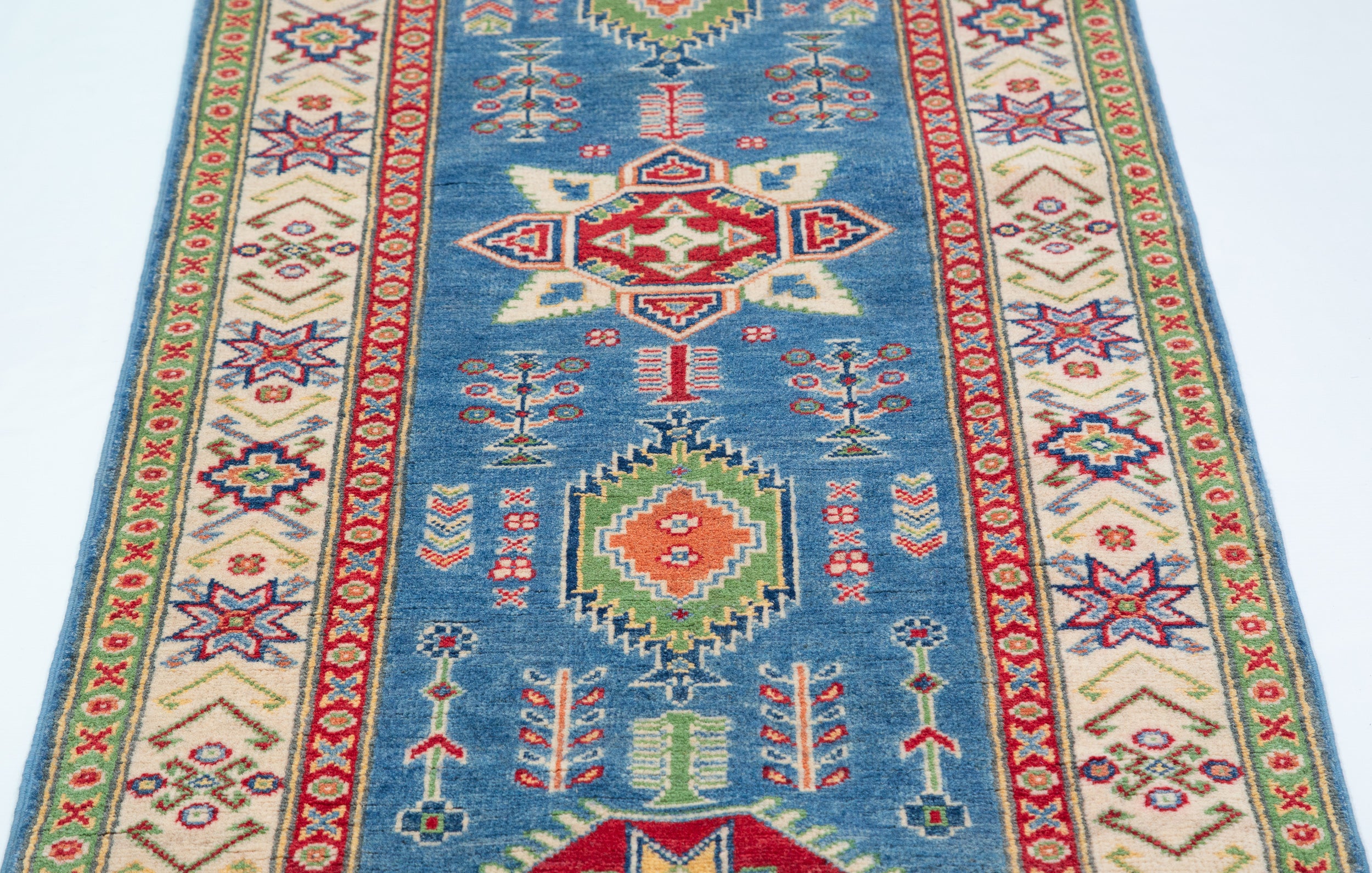 Pattern detail of blue & ivory Kazak-inspired wool runner 29655.