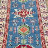 Pattern detail of blue & ivory Kazak-inspired wool runner 29655.
