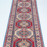 Full view from a low angle of blue & red Kazak-inspired wool runner 29656.