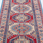 Pattern detail of blue & red Kazak-inspired wool runner 29656.