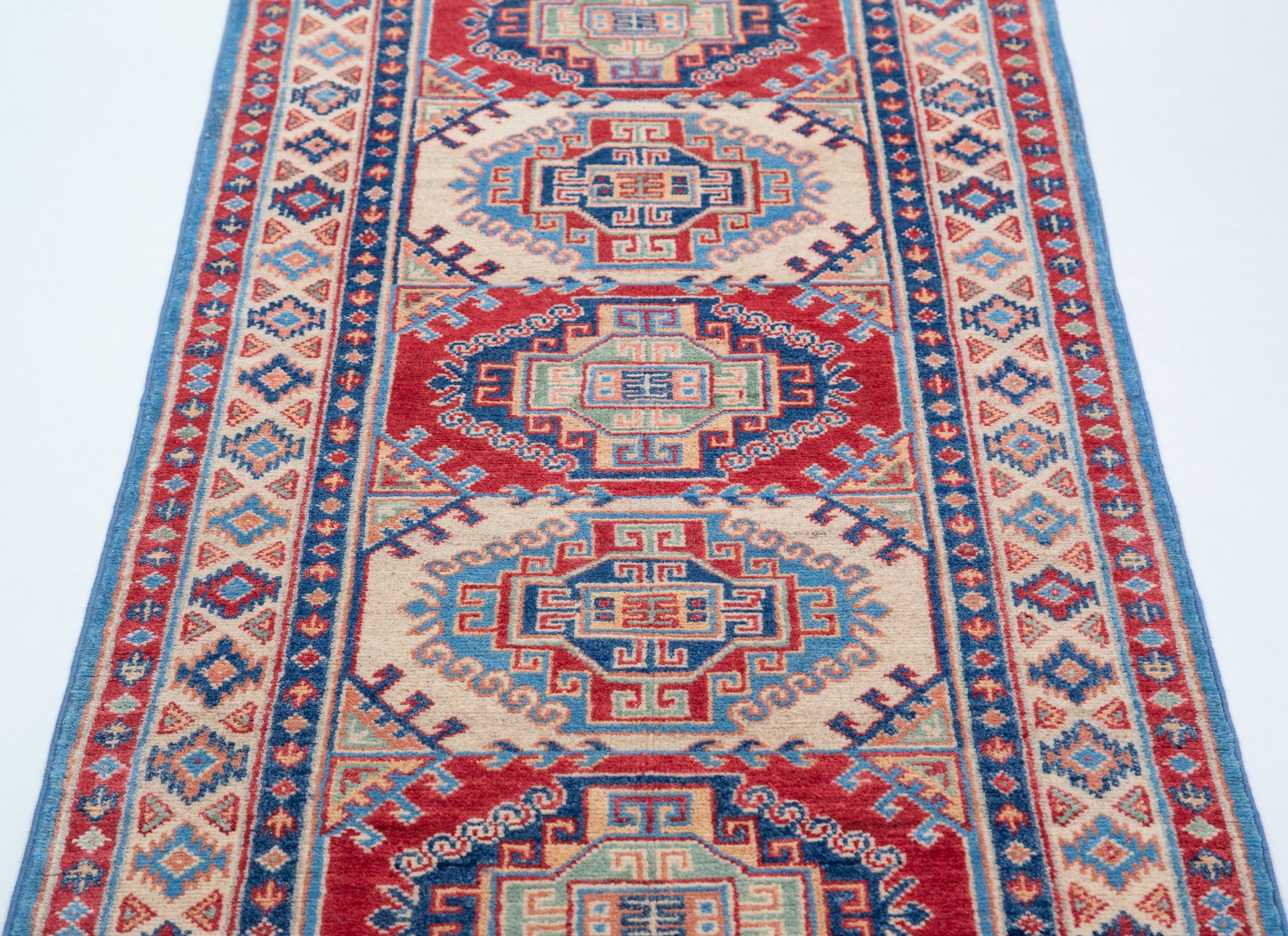 Pattern detail of blue & red Kazak-inspired wool runner 29656.
