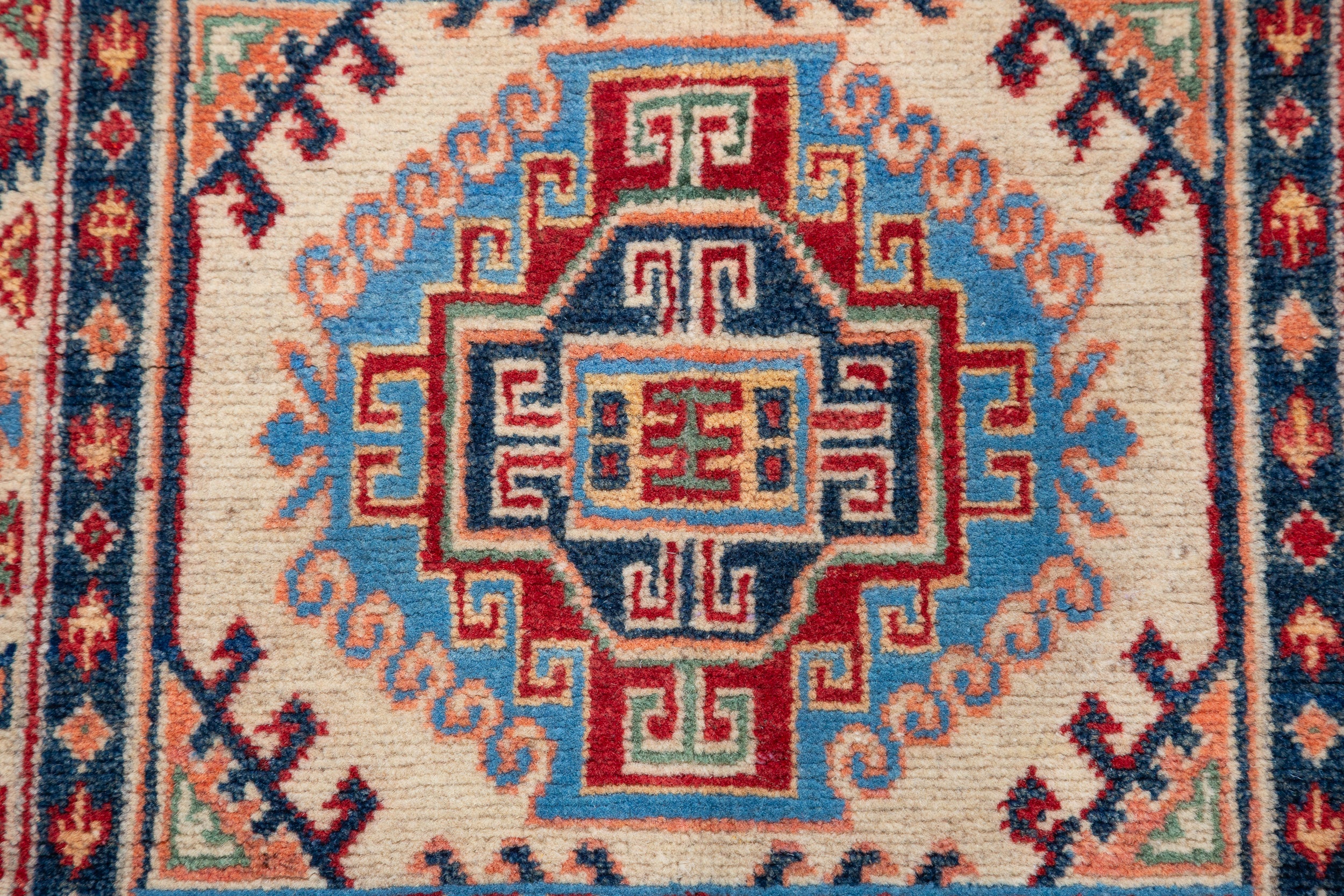 Pattern detail of blue & red Kazak-inspired wool runner 29656.