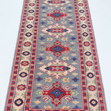 Full view from a low angle of blue & ivory Kazak-inspired wool runner 29657.