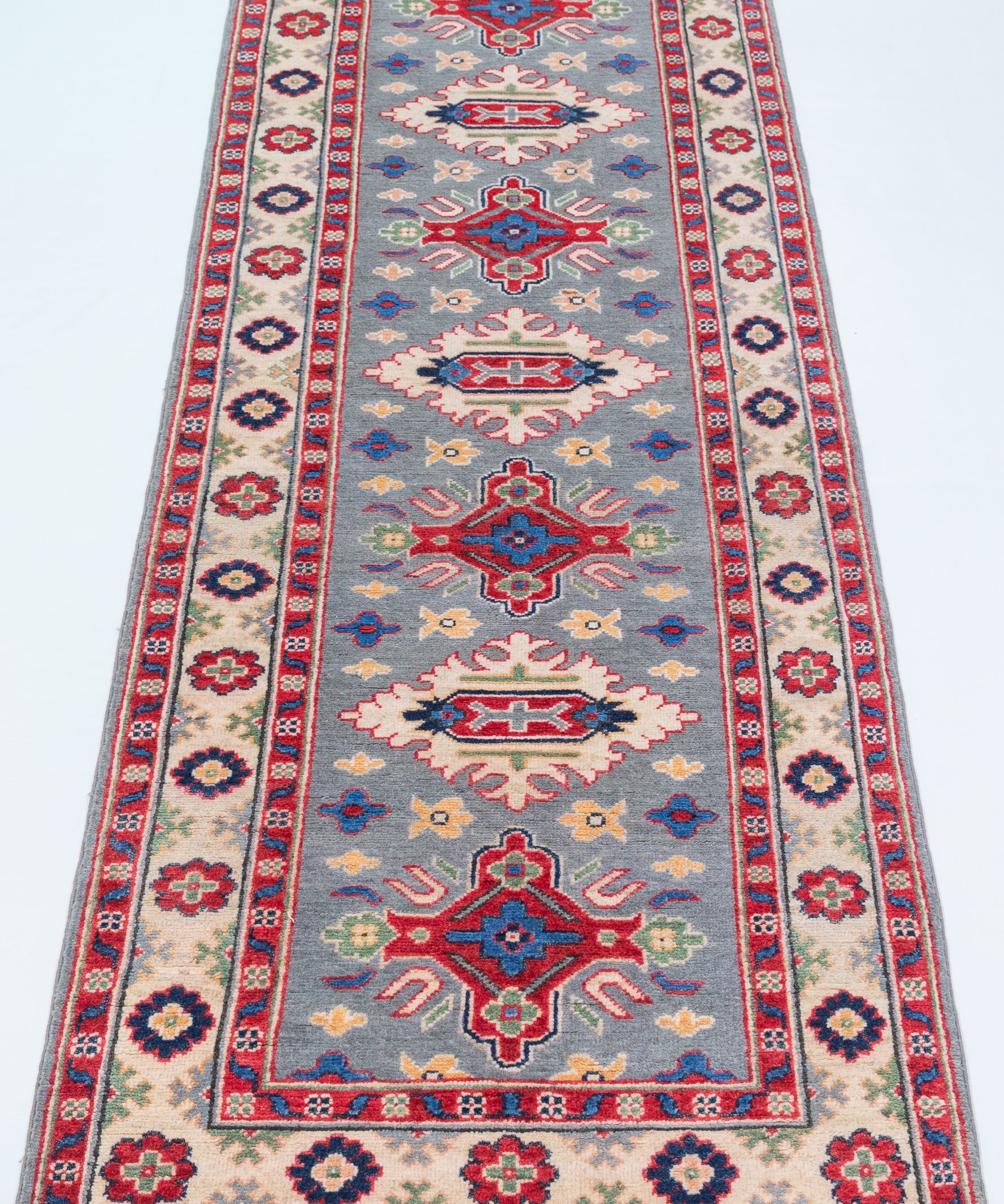 Full view from a low angle of blue & ivory Kazak-inspired wool runner 29657.