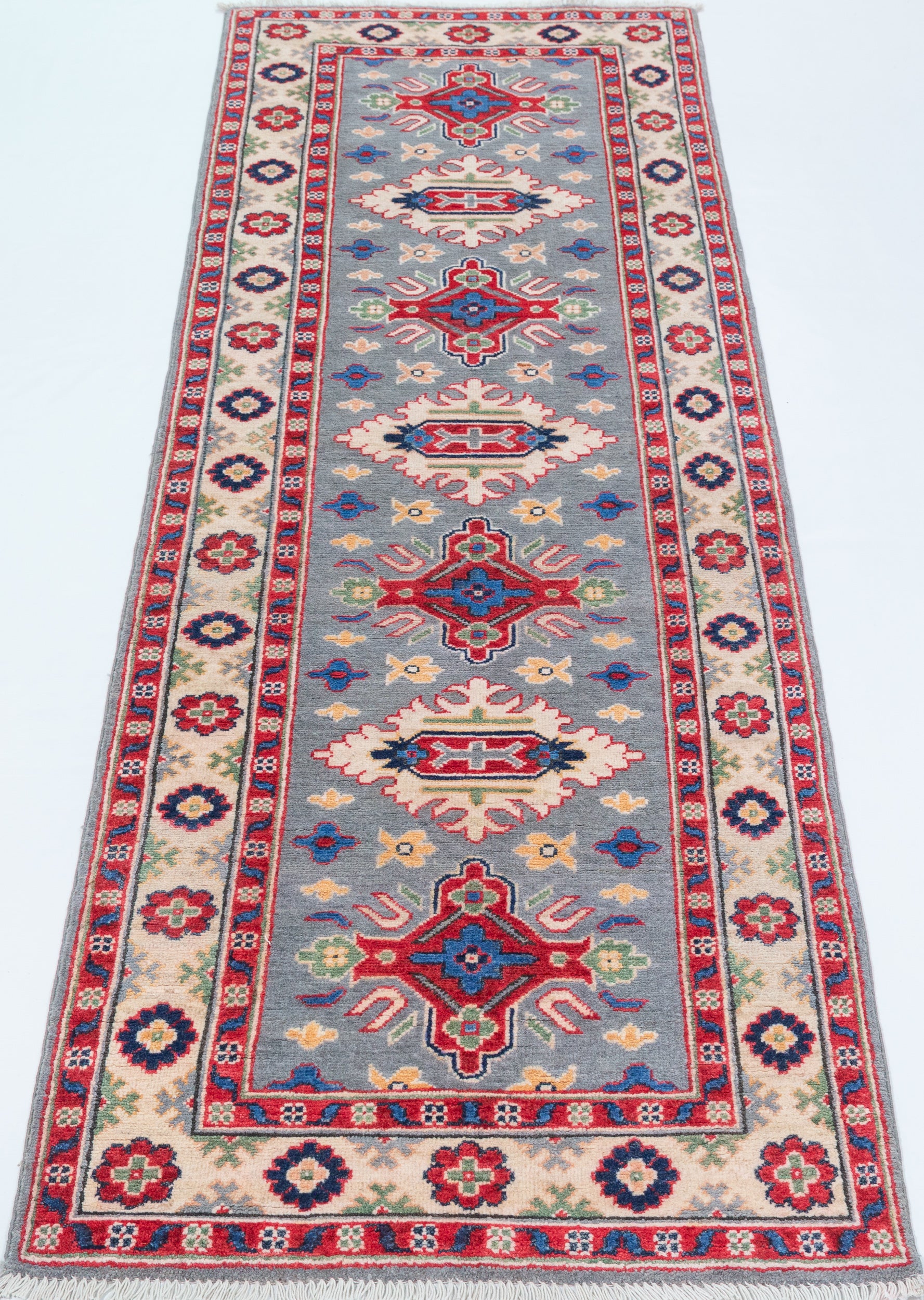 Full view from a low angle of blue & ivory Kazak-inspired wool runner 29657.