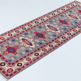 Full view at an angle of blue & ivory Kazak-inspired wool runner 29657.
