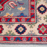 Border and edge detail of blue & ivory Kazak-inspired wool runner 29657.