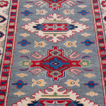 Pattern detail of blue & ivory Kazak-inspired wool runner 29657.