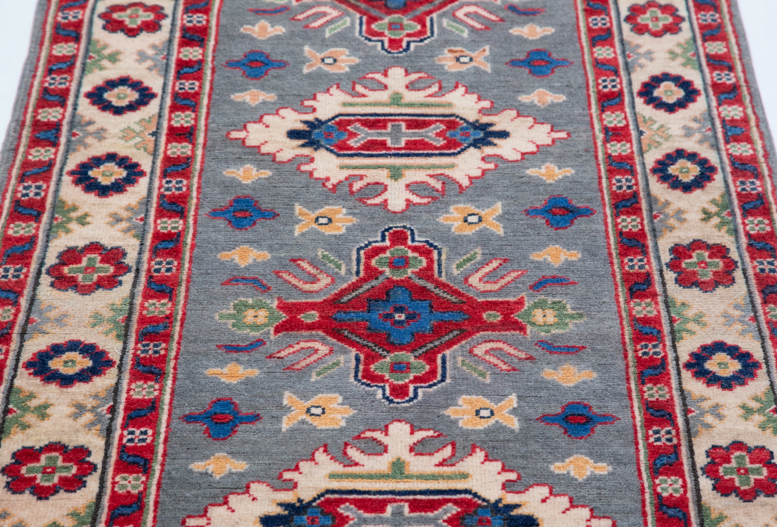 Pattern detail of blue & ivory Kazak-inspired wool runner 29657.