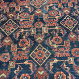 Vintage Nanaj Rug — Angular Medallion & Dense Red and Deep Blue Motifs. Original rug photograph; SKU 30060; source 30060 IMG_6772.