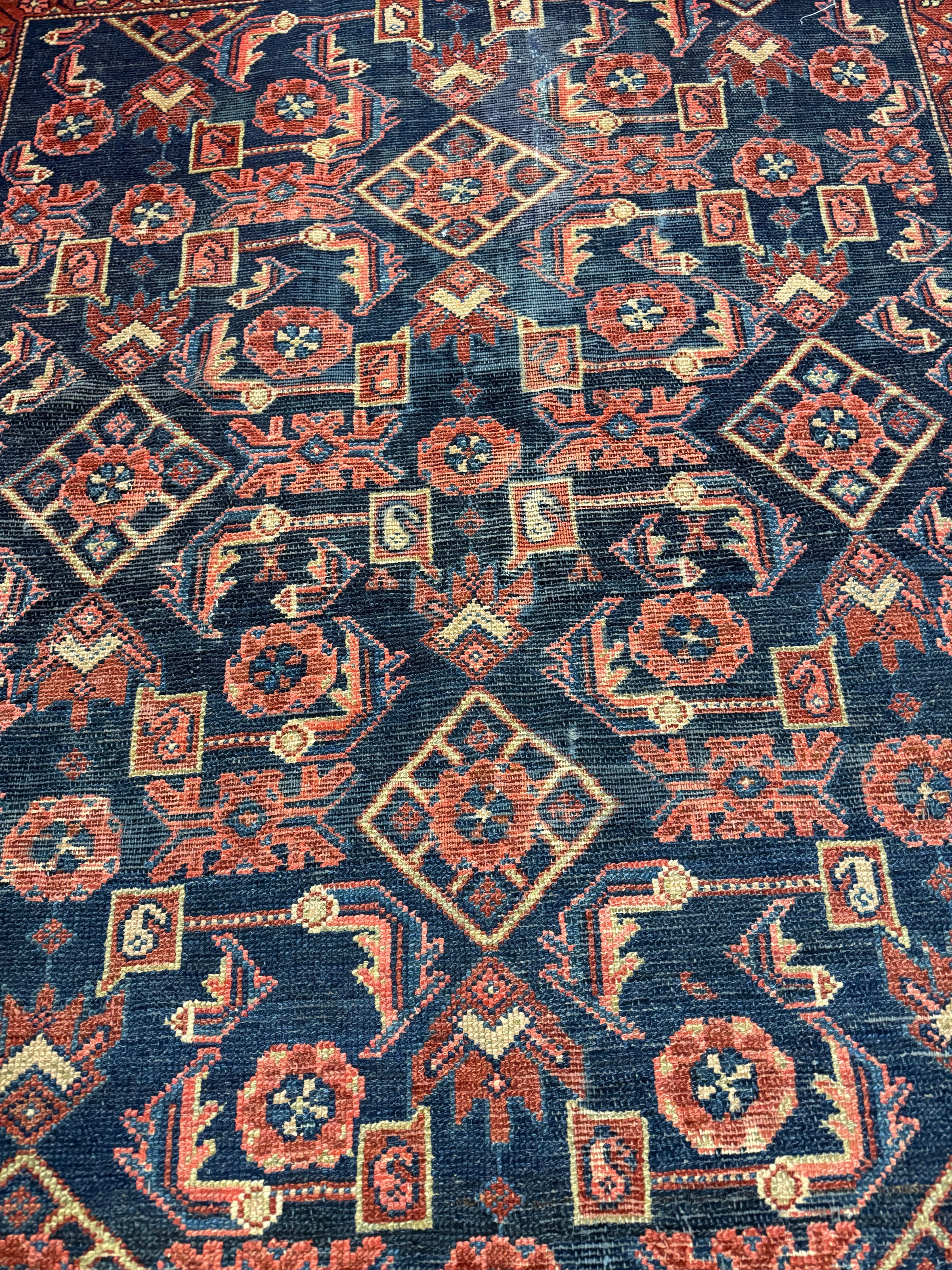 Vintage Nanaj Rug — Angular Medallion & Dense Red and Deep Blue Motifs. Original rug photograph; SKU 30060; source 30060 IMG_6772.