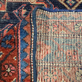 Vintage Nanaj Rug — Angular Medallion & Dense Red and Deep Blue Motifs. Original rug photograph; SKU 30060; source 30060 IMG_6774.