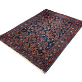 Persian Nanaj Rug, diagonal full view, hand-knotted wool with blue colouring. SKU 30060.