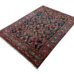 Persian Nanaj Rug, diagonal full view, hand-knotted wool with blue colouring. SKU 30060.