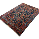 Persian Nanaj Rug, diagonal full view, hand-knotted wool with blue colouring. SKU 30060.