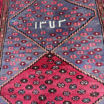 Vintage Houpa Zanjan Rug — Three Red Geometric Medallions on a Dark Field. Original rug photograph; SKU 30175; source 30175 IMG_6714.